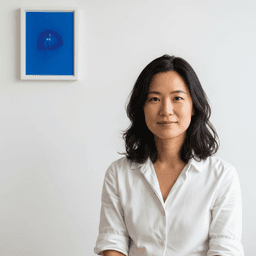 B&W high contrast editorial portrait, 30s Asian woman, dramatic side light, Hasselblad